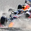 MONZA, ITALY - SEPTEMBER 12: Max Verstappen of the Netherlands driving the (33) Red Bull Racing RB16B Honda and Lewis Hamilton of Great Britain driving the (44) Mercedes AMG Petronas F1 Team Mercedes W12 crash during the F1 Grand Prix of Italy at Autodromo di Monza on September 12, 2021 in Monza, Italy. (Photo by Peter Van Egmond/Getty Images)