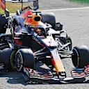 MONZA, ITALY - SEPTEMBER 12: Max Verstappen of the Netherlands driving the (33) Red Bull Racing RB16B Honda and Lewis Hamilton of Great Britain driving the (44) Mercedes AMG Petronas F1 Team Mercedes W12 crash during the F1 Grand Prix of Italy at Autodromo di Monza on September 12, 2021 in Monza, Italy. (Photo by Peter Van Egmond/Getty Images)