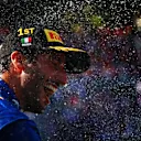 MONZA, ITALY - SEPTEMBER 12: Race winner Daniel Ricciardo of Australia and McLaren F1 celebrates on the podium during the F1 Grand Prix of Italy at Autodromo di Monza on September 12, 2021 in Monza, Italy. (Photo by Dan Istitene - Formula 1/Formula 1 via Getty Images)