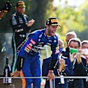 MONZA, ITALY - SEPTEMBER 12: Race winner Daniel Ricciardo of Australia and McLaren F1 celebrates on the podium during the F1 Grand Prix of Italy at Autodromo di Monza on September 12, 2021 in Monza, Italy. (Photo by Clive Mason - Formula 1/Formula 1 via Getty Images)