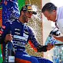 MONZA, ITALY - SEPTEMBER 12: Race winner Daniel Ricciardo of Australia and McLaren F1 and McLaren Chief Executive Officer Zak Brown celebrate on the podium during the F1 Grand Prix of Italy at Autodromo di Monza on September 12, 2021 in Monza, Italy. (Photo by Dan Istitene - Formula 1/Formula 1 via Getty Images)