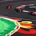 MEXICO CITY, MEXICO - NOVEMBER 05: Charles Leclerc of Monaco driving the (16) Scuderia Ferrari SF21 leads Sergio Perez of Mexico driving the (11) Red Bull Racing RB16B Honda and Carlos Sainz of Spain driving the (55) Scuderia Ferrari SF21 during practice ahead of the F1 Grand Prix of Mexico at Autodromo Hermanos Rodriguez on November 05, 2021 in Mexico City, Mexico. (Photo by Mark Thompson/Getty Images)