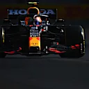 MEXICO CITY, MEXICO - NOVEMBER 05: Sergio Perez of Mexico driving the (11) Red Bull Racing RB16B Honda during practice ahead of the F1 Grand Prix of Mexico at Autodromo Hermanos Rodriguez on November 05, 2021 in Mexico City, Mexico. (Photo by Clive Mason/Getty Images)