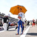 MEXICO CITY, MEXICO - NOVEMBER 07: Lando Norris of Great Britain and McLaren F1 walks to the grid before the F1 Grand Prix of Mexico at Autodromo Hermanos Rodriguez on November 07, 2021 in Mexico City, Mexico. (Photo by Bryn Lennon - Formula 1/Formula 1 via Getty Images)
