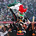 MEXICO CITY, MEXICO - NOVEMBER 07: Third placed Sergio Perez of Mexico and Red Bull Racing celebrates in parc ferme during the F1 Grand Prix of Mexico at Autodromo Hermanos Rodriguez on November 07, 2021 in Mexico City, Mexico. (Photo by Lars Baron/Getty Images)