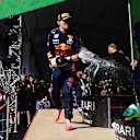 MEXICO CITY, MEXICO - NOVEMBER 07: Race winner Max Verstappen of Netherlands and Red Bull Racing celebrates on the podium during the F1 Grand Prix of Mexico at Autodromo Hermanos Rodriguez on November 07, 2021 in Mexico City, Mexico. (Photo by Mario Renzi - Formula 1/Formula 1 via Getty Images)