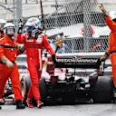 MONTE-CARLO, MONACO - MAY 22: Pole position qualifier Charles Leclerc of Monaco and Ferrari waves to the crowd after crashing during qualifying for the F1 Grand Prix of Monaco at Circuit de Monaco on May 22, 2021 in Monte-Carlo, Monaco. (Photo by Clive Rose - Formula 1/Formula 1 via Getty Images)