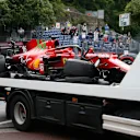 MONTE-CARLO, MONACO - MAY 22: The car of Charles Leclerc of Monaco and Ferrari is seen on the back of a recovery truck after crashing on track during qualifying prior to the F1 Grand Prix of Monaco at Circuit de Monaco on May 22, 2021 in Monte-Carlo, Monaco. (Photo by Sebastien Nogier - Pool/Getty Images)