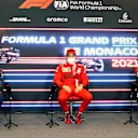 MONTE-CARLO, MONACO - MAY 22: Second placed qualifier Max Verstappen of Netherlands and Red Bull Racing, pole position qualifier Charles Leclerc of Monaco and Ferrari and third placed qualifier Valtteri Bottas of Finland and Mercedes GP talk during a Press Conference after qualifying prior to the F1 Grand Prix of Monaco at Circuit de Monaco on May 22, 2021 in Monte-Carlo, Monaco. (Photo by Zak Mauger - Pool/Getty Images)