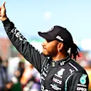 ZANDVOORT, NETHERLANDS - SEPTEMBER 04: Second place qualifier Lewis Hamilton of Great Britain and Mercedes GP waves to the crowd from parc ferme during qualifying ahead of the F1 Grand Prix of The Netherlands at Circuit Zandvoort on September 04, 2021 in Zandvoort, Netherlands. (Photo by Dan Istitene - Formula 1/Formula 1 via Getty Images)