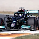 ZANDVOORT, NETHERLANDS - SEPTEMBER 05: Lewis Hamilton of Great Britain driving the (44) Mercedes AMG Petronas F1 Team Mercedes W12 during the F1 Grand Prix of The Netherlands at Circuit Zandvoort on September 05, 2021 in Zandvoort, Netherlands. (Photo by Lars Baron/Getty Images)