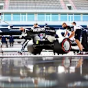 PORTIMAO, PORTUGAL - MAY 01: Yuki Tsunoda of Japan driving the (22) Scuderia AlphaTauri AT02 Honda is pushed back into the garage during qualifying for the F1 Grand Prix of Portugal at Autodromo Internacional Do Algarve on May 01, 2021 in Portimao, Portugal. (Photo by Peter Fox/Getty Images)