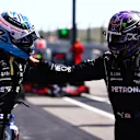 PORTIMAO, PORTUGAL - MAY 01: Pole position qualifier Valtteri Bottas of Finland and Mercedes GP and second place qualifier Lewis Hamilton of Great Britain and Mercedes GP congratulate each other in parc ferme during qualifying for the F1 Grand Prix of Portugal at Autodromo Internacional Do Algarve on May 01, 2021 in Portimao, Portugal. (Photo by Dan Istitene - Formula 1/Formula 1 via Getty Images)