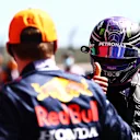 PORTIMAO, PORTUGAL - MAY 01: Second place qualifier Lewis Hamilton of Great Britain and Mercedes GP shakes hands with third place qualifier Max Verstappen of Netherlands and Red Bull Racing in parc ferme during qualifying for the F1 Grand Prix of Portugal at Autodromo Internacional Do Algarve on May 01, 2021 in Portimao, Portugal. (Photo by Dan Istitene - Formula 1/Formula 1 via Getty Images)