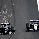 PORTIMAO, PORTUGAL - MAY 02: Pierre Gasly of France driving the (10) Scuderia AlphaTauri AT02 Honda overtakes George Russell of Great Britain driving the (63) Williams Racing FW43B Mercedes during the F1 Grand Prix of Portugal at Autodromo Internacional Do Algarve on May 02, 2021 in Portimao, Portugal. (Photo by Dan Istitene - Formula 1/Formula 1 via Getty Images)