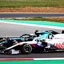 PORTIMAO, PORTUGAL - MAY 02: Sebastian Vettel of Germany driving the (5) Aston Martin AMR21 Mercedes and Mick Schumacher of Germany driving the (47) Haas F1 Team VF-21 Ferrari battle for position during the F1 Grand Prix of Portugal at Autodromo Internacional Do Algarve on May 02, 2021 in Portimao, Portugal. (Photo by Dan Istitene - Formula 1/Formula 1 via Getty Images)