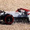 PORTIMAO, PORTUGAL - MAY 02: Kimi Raikkonen of Finland driving the (7) Alfa Romeo Racing C41 Ferrari in the gravel with a broken front wing during the F1 Grand Prix of Portugal at Autodromo Internacional Do Algarve on May 02, 2021 in Portimao, Portugal. (Photo by Dan Istitene - Formula 1/Formula 1 via Getty Images)
