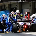 PORTIMAO, PORTUGAL - MAY 02: Nikita Mazepin of Russia driving the (9) Haas F1 Team VF-21 Ferrari comes in for a tyre change during the F1 Grand Prix of Portugal at Autodromo Internacional Do Algarve on May 02, 2021 in Portimao, Portugal. (Photo by Peter Fox/Getty Images)