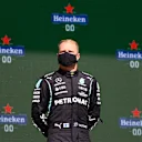 PORTIMAO, PORTUGAL - MAY 02: Third placed Valtteri Bottas of Finland and Mercedes GP celebrates on the podium during the F1 Grand Prix of Portugal at Autodromo Internacional Do Algarve on May 02, 2021 in Portimao, Portugal. (Photo by Bryn Lennon/Getty Images)