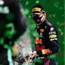 PORTIMAO, PORTUGAL - MAY 02: Second placed Max Verstappen of Netherlands and Red Bull Racing celebrates with sparkling wine on the podium during the F1 Grand Prix of Portugal at Autodromo Internacional Do Algarve on May 02, 2021 in Portimao, Portugal. (Photo by Mario Renzi - Formula 1/Formula 1 via Getty Images)