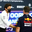 DOHA, QATAR - NOVEMBER 19: Mercedes GP Executive Director Toto Wolff and Red Bull Racing Team Principal Christian Horner talk in the Team Principals Press Conference during practice ahead of the F1 Grand Prix of Qatar at Losail International Circuit on November 19, 2021 in Doha, Qatar. (Photo by Dan Istitene/Getty Images)