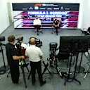 DOHA, QATAR - NOVEMBER 19: Mercedes GP Executive Director Toto Wolff and Red Bull Racing Team Principal Christian Horner talk in the Team Principals Press Conference during practice ahead of the F1 Grand Prix of Qatar at Losail International Circuit on November 19, 2021 in Doha, Qatar. (Photo by Dan Istitene/Getty Images)