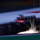 DOHA, QATAR - NOVEMBER 19: Sparks fly behind Max Verstappen of the Netherlands driving the (33) Red Bull Racing RB16B Honda during practice ahead of the F1 Grand Prix of Qatar at Losail International Circuit on November 19, 2021 in Doha, Qatar. (Photo by Mario Renzi - Formula 1/Formula 1 via Getty Images)
