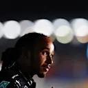 DOHA, QATAR - NOVEMBER 20: Pole position qualifier Lewis Hamilton of Great Britain and Mercedes GP talks to the media in parc ferme during qualifying ahead of the F1 Grand Prix of Qatar at Losail International Circuit on November 20, 2021 in Doha, Qatar. (Photo by Dan Istitene - Formula 1/Formula 1 via Getty Images)