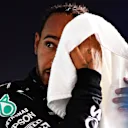 DOHA, QATAR - NOVEMBER 20: Pole position qualifier Lewis Hamilton of Great Britain and Mercedes GP looks on in parc ferme after qualifying ahead of the F1 Grand Prix of Qatar at Losail International Circuit on November 20, 2021 in Doha, Qatar. (Photo by Mario Renzi - Formula 1/Formula 1 via Getty Images)