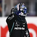 DOHA, QATAR - NOVEMBER 20: Third placed Valtteri Bottas of Finland and Mercedes GP celebrates in parc ferme during qualifying ahead of the F1 Grand Prix of Qatar at Losail International Circuit on November 20, 2021 in Doha, Qatar. (Photo by Lars Baron/Getty Images)