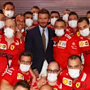 DOHA, QATAR - NOVEMBER 21: David Beckham poses for a photo with the Ferrari team before the F1 Grand Prix of Qatar at Losail International Circuit on November 21, 2021 in Doha, Qatar. (Photo by Dan Istitene - Formula 1/Formula 1 via Getty Images)