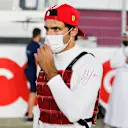 DOHA, QATAR - NOVEMBER 21: Carlos Sainz of Spain and Ferrari looks on from the grid during the F1 Grand Prix of Qatar at Losail International Circuit on November 21, 2021 in Doha, Qatar. (Photo by Hamad I Mohammed - Pool/Getty Images)