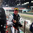 DOHA, QATAR - NOVEMBER 21: Race winner Lewis Hamilton of Great Britain and Mercedes GP and third placed Fernando Alonso of Spain and Alpine F1 Team celebrate on the podium during the F1 Grand Prix of Qatar at Losail International Circuit on November 21, 2021 in Doha, Qatar. (Photo by Dan Istitene - Formula 1/Formula 1 via Getty Images)