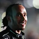 DOHA, QATAR - NOVEMBER 21: Race winner Lewis Hamilton of Great Britain and Mercedes GP looks on as he is interviewed in parc ferme during the F1 Grand Prix of Qatar at Losail International Circuit on November 21, 2021 in Doha, Qatar. (Photo by Dan Istitene - Formula 1/Formula 1 via Getty Images)