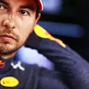 DOHA, QATAR - NOVEMBER 21: Sergio Perez of Mexico and Red Bull Racing prepares to drive in the garage before the F1 Grand Prix of Qatar at Losail International Circuit on November 21, 2021 in Doha, Qatar. (Photo by Mark Thompson/Getty Images)