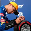 SOCHI, RUSSIA - SEPTEMBER 25: Pole position qualifier Lando Norris of Great Britain and McLaren F1 celebrates in parc ferme during qualifying ahead of the F1 Grand Prix of Russia at Sochi Autodrom on September 25, 2021 in Sochi, Russia. (Photo by Yuri Kochetkov - Pool/Getty Images)