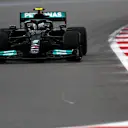 SOCHI, RUSSIA - SEPTEMBER 25: Valtteri Bottas of Finland driving the (77) Mercedes AMG Petronas F1 Team Mercedes W12 on track during qualifying ahead of the F1 Grand Prix of Russia at Sochi Autodrom on September 25, 2021 in Sochi, Russia. (Photo by Rudy Carezzevoli/Getty Images)