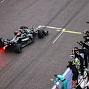 SOCHI, RUSSIA - SEPTEMBER 26: Race winner Lewis Hamilton of Great Britain driving the (44) Mercedes AMG Petronas F1 Team Mercedes W12 passes his team celebrating on the pitwall during the F1 Grand Prix of Russia at Sochi Autodrom on September 26, 2021 in Sochi, Russia. (Photo by Lars Baron - Formula 1/Formula 1 via Getty Images)