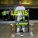 SOCHI, RUSSIA - SEPTEMBER 26: Lewis Hamilton of Mercedes and Great Britain celebrates winning his 100th Grand Prix during the F1 Grand Prix of Russia at Sochi Autodrom on September 26, 2021 in Sochi, Russia. (Photo by Peter Fox/Getty Images)