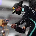 SOCHI, RUSSIA - SEPTEMBER 26: Race winner Lewis Hamilton of Great Britain and Mercedes GP celebrates on the podium during the F1 Grand Prix of Russia at Sochi Autodrom on September 26, 2021 in Sochi, Russia. (Photo by Mario Renzi - Formula 1/Formula 1 via Getty Images)