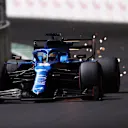 JEDDAH, SAUDI ARABIA - DECEMBER 03: Sparks fly behind Fernando Alonso of Spain driving the (14) Alpine A521 Renault during practice ahead of the F1 Grand Prix of Saudi Arabia at Jeddah Corniche Circuit on December 03, 2021 in Jeddah, Saudi Arabia. (Photo by Lars Baron/Getty Images)