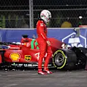 JEDDAH, SAUDI ARABIA - DECEMBER 03: Charles Leclerc of Monaco and Ferrari looks at his car after crashing during practice ahead of the F1 Grand Prix of Saudi Arabia at Jeddah Corniche Circuit on December 03, 2021 in Jeddah, Saudi Arabia. (Photo by Lars Baron/Getty Images)