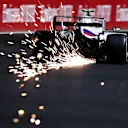 JEDDAH, SAUDI ARABIA - DECEMBER 03: Sparks fly behind Mick Schumacher of Germany driving the (47) Haas F1 Team VF-21 Ferrari during practice ahead of the F1 Grand Prix of Saudi Arabia at Jeddah Corniche Circuit on December 03, 2021 in Jeddah, Saudi Arabia. (Photo by Lars Baron/Getty Images)