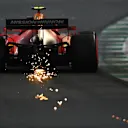 JEDDAH, SAUDI ARABIA - DECEMBER 04: Sparks fly behind Carlos Sainz of Spain driving the (55) Scuderia Ferrari SF21 during final practice ahead of the F1 Grand Prix of Saudi Arabia at Jeddah Corniche Circuit on December 04, 2021 in Jeddah, Saudi Arabia. (Photo by Dan Mullan/Getty Images)