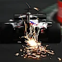 JEDDAH, SAUDI ARABIA - DECEMBER 04: Sparks fly behind Nikita Mazepin of Russia driving the (9) Haas F1 Team VF-21 Ferrari during final practice ahead of the F1 Grand Prix of Saudi Arabia at Jeddah Corniche Circuit on December 04, 2021 in Jeddah, Saudi Arabia. (Photo by Dan Mullan/Getty Images)