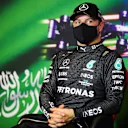 JEDDAH, SAUDI ARABIA - DECEMBER 04: Second place qualifier Valtteri Bottas of Finland and Mercedes GP talks in the press conference after qualifying ahead of the F1 Grand Prix of Saudi Arabia at Jeddah Corniche Circuit on December 04, 2021 in Jeddah, Saudi Arabia. (Photo by Florent Gooden - Pool/Getty Images)