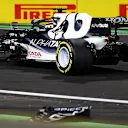 JEDDAH, SAUDI ARABIA - DECEMBER 05: Yuki Tsunoda of Japan driving the (22) Scuderia AlphaTauri AT02 Honda with a broken front wing after a crash  during the F1 Grand Prix of Saudi Arabia at Jeddah Corniche Circuit on December 05, 2021 in Jeddah, Saudi Arabia. (Photo by Bryn Lennon - Formula 1/Formula 1 via Getty Images)