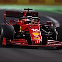 JEDDAH, SAUDI ARABIA - DECEMBER 05: Charles Leclerc of Monaco driving the (16) Scuderia Ferrari SF21 on track during the F1 Grand Prix of Saudi Arabia at Jeddah Corniche Circuit on December 05, 2021 in Jeddah, Saudi Arabia. (Photo by Mark Thompson/Getty Images)