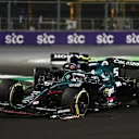 JEDDAH, SAUDI ARABIA - DECEMBER 05: Sebastian Vettel of Germany driving the (5) Aston Martin AMR21 Mercedes and Yuki Tsunoda of Japan driving the (22) Scuderia AlphaTauri AT02 Honda collide during the F1 Grand Prix of Saudi Arabia at Jeddah Corniche Circuit on December 05, 2021 in Jeddah, Saudi Arabia. (Photo by Bryn Lennon - Formula 1/Formula 1 via Getty Images)