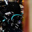 BARCELONA, SPAIN - MAY 07: Lewis Hamilton of Great Britain driving the (44) Mercedes AMG Petronas F1 Team Mercedes W12 is pushed into the garage during practice for the F1 Grand Prix of Spain at Circuit de Barcelona-Catalunya on May 07, 2021 in Barcelona, Spain. (Photo by Mario Renzi - Formula 1/Formula 1 via Getty Images)